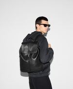 Medium-sized backpack with webbing strap